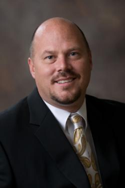 Spencer Atkins : Director